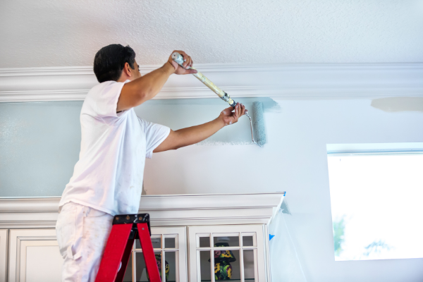 Professional painting kitchen in apartment